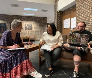 1024x768-Commuter-Council.jpg Three members of commuter council share ideas