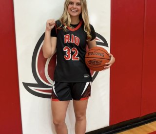 Marlee Grinstead Posing on basketball court