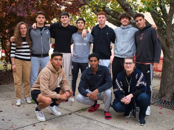 Pictured is students of the ESL Program with Professor Moyer