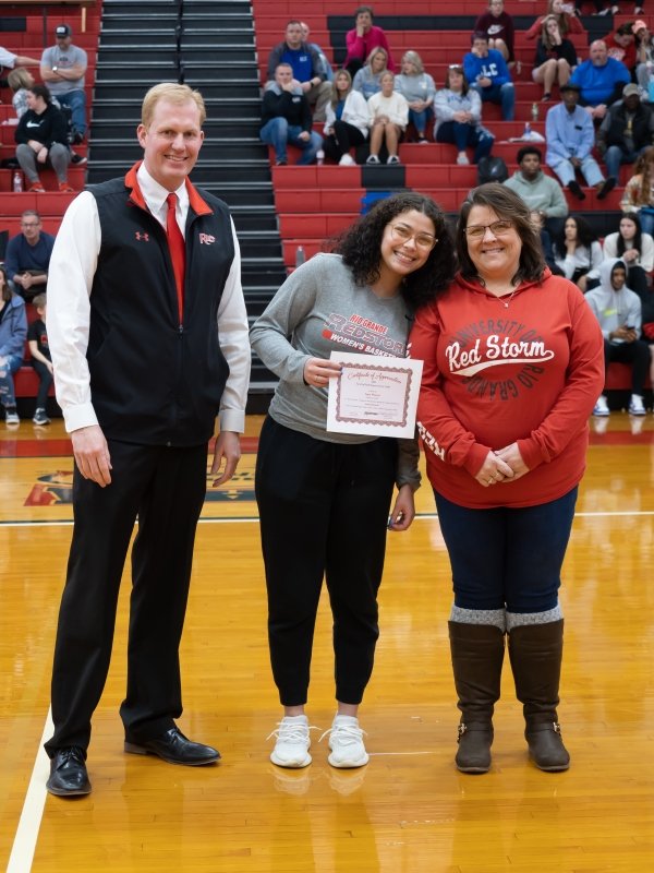 Student Athlete and President Smith recognize Amy Weaver