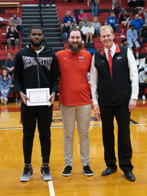 Student Athlete and President Smith recognize Cal Cistaro