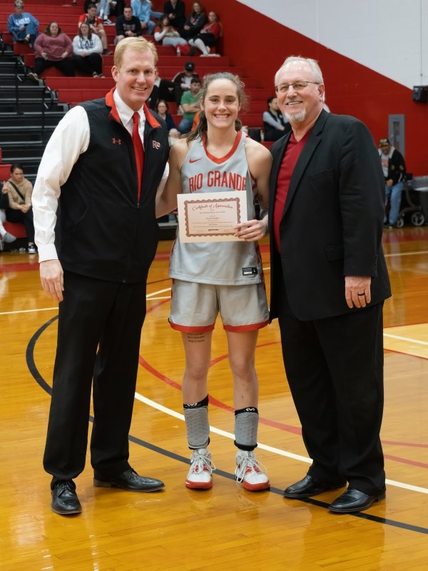 Student Athlete and President Smith recognize David Smalley