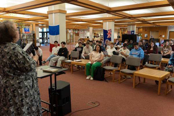 Staff Addressing the Crowd at Words of the World Event