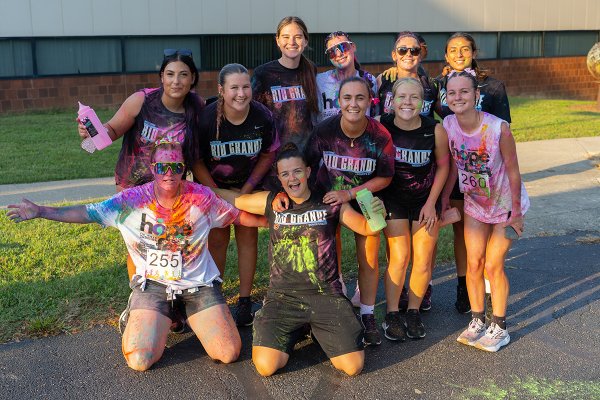 Group of female students after color run